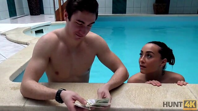 Sexy brunette gets fingered & fucked in a private pool while being cuckolded