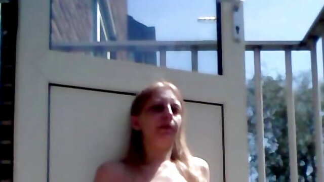 Topless Smoking On The Balcony  