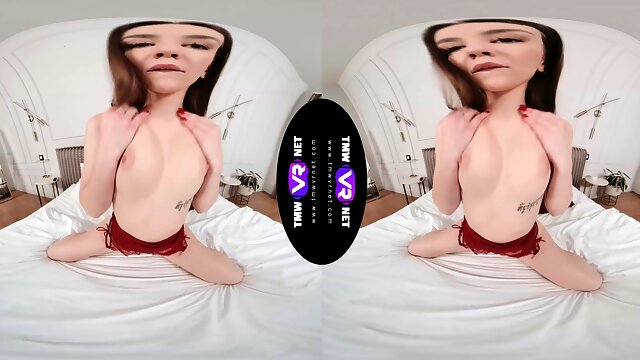 Watch Vivian Grace strip down and tease her shaved pussy in virtual reality