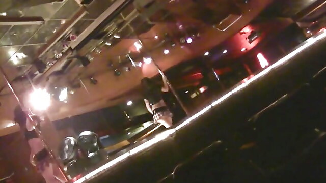 Hot girlfriend filmed in a strip bar dancing