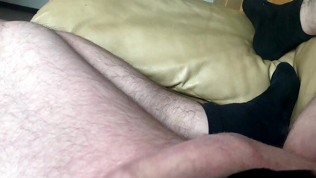 Lying on the sofa playing but my cock dreams of a wet pussy