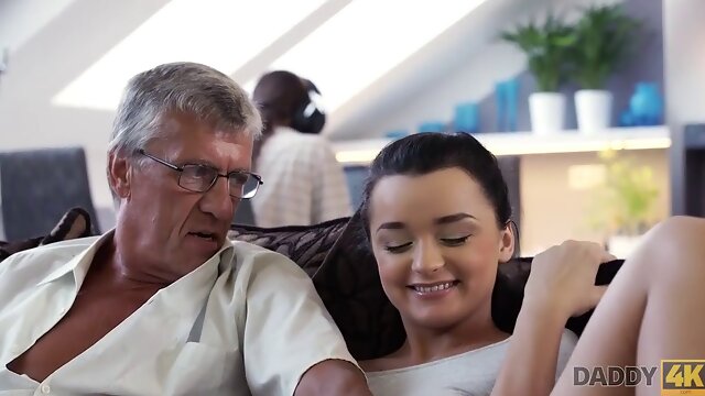 Naughty stepdad fucks stunning brunette on sofa with expert skills