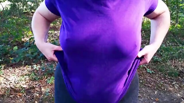 Spanking my naked tits in the woods