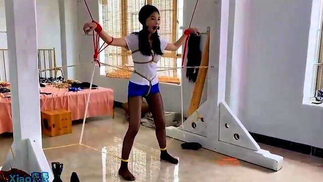 Lovely Chinese girl tied up and gagged in BDSM training