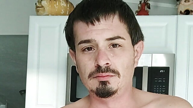 Masturbating in the kitchen window 