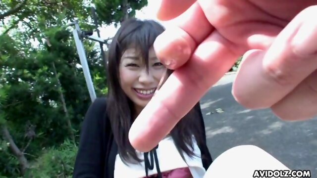 Japanese brunette Karin Asahi lets a stranger fingerfuck her hairy pussy on the street uncensored.