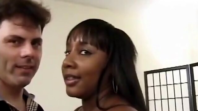 Dark-skinned MILF tries a white cock and gets her tits creamed