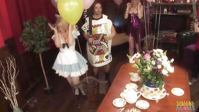A group of horny men and super naughty women fuck hard dressed up in Alice in Wonderland costumes