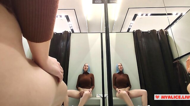 Risky masturbation in a fitting room in a mall. I wanted to take a risk and get a quick orgasm by fucking myself in the fitting