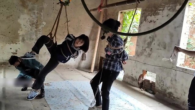 Two girls suspended in an abandoned house