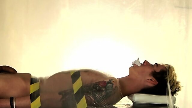 Cute gay chap likes to get his dick teased in a fetish scene
