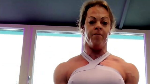 How long would you last in bed with this muscle mommy?