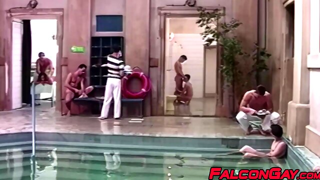 Andrej gulps down Michals uncut cock in the middle of a public pool