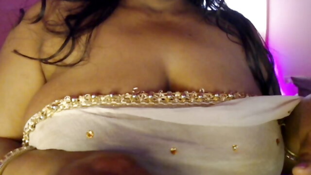 Hot sister-in-law shows her boobs and nipples through the bra and then opens the bra and wears a saree, showing her nipples.