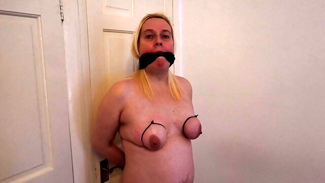 Slave wife on display with tied tits