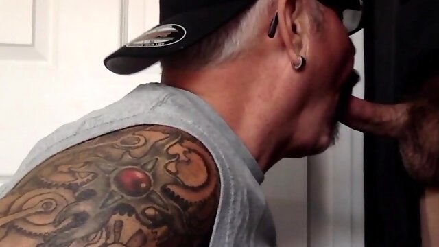 Gloryhole cum loving DILF sucks dick