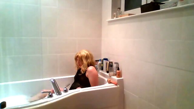 Black lacy gown in the bath