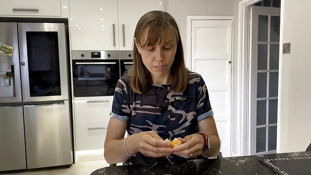 Seductively Eating an orange