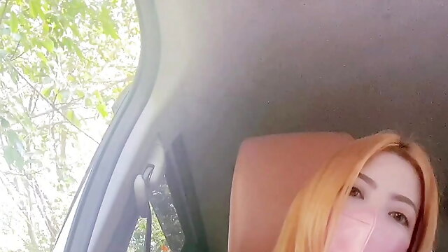  Beautiful Thai student masturbates in the car