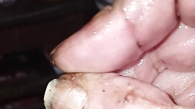 Jerking off the cock head and shaft and finger fucking in the urethra that  has as split in half 