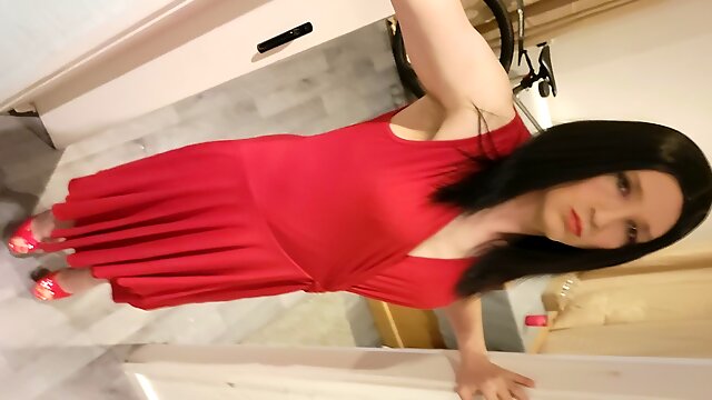 Crossdresser wanking in red dress