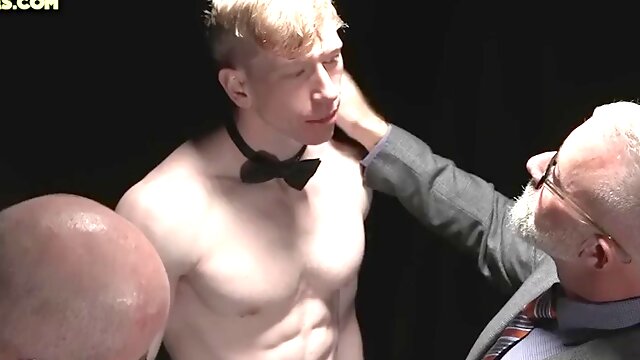 Obedient stud fucked by mature gay dad in front of voyeurs