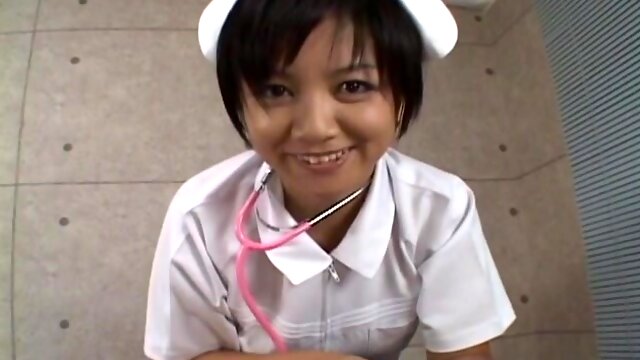 Japanese nurse Meguru Kosaka drops on her knees to give a blowjob