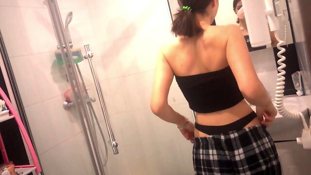 Horny Russian brunette sucks and jerks big cock in bathroom