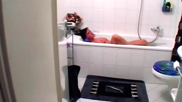 An Amazing German Woman Dildoing Her Muff In The Bathtub