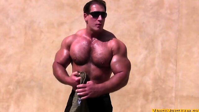 George Shows Off His Muscles