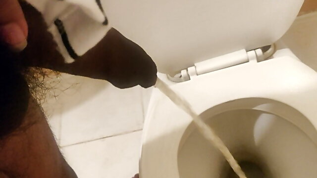 Indian black dick men peeing in the toilet 
