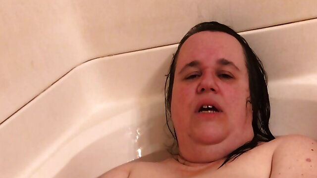Naomi takes a bath.
