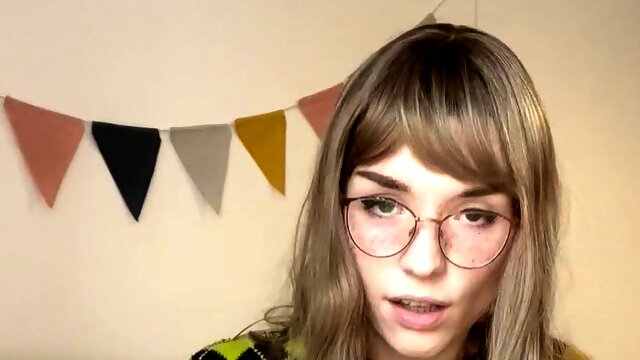 Long Haired Tranny in Glasses Jerking Off