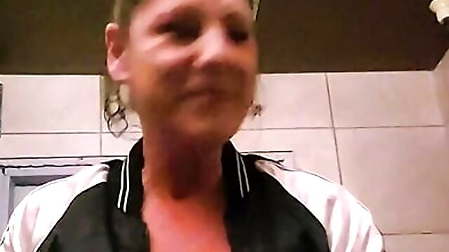 Just a horny milf peeing and masturbating in public bar