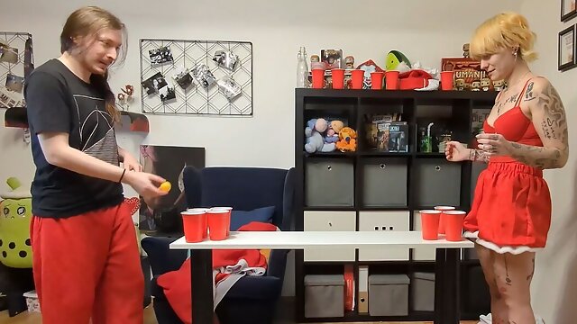 A Naughty Couple Is Playing a Game of Strip Pong