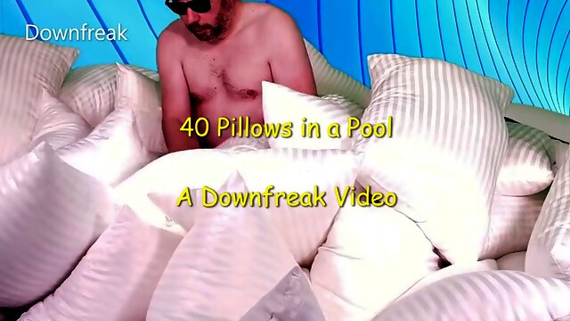 Pillow fucks 40 pillows in an inflatable pool