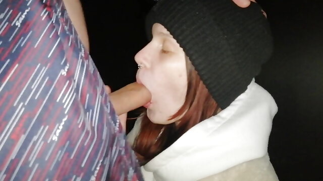 Perfect oral from a redhead with swallowing during a winter night in the woods