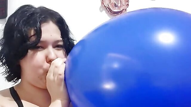 Blowing up HUGE blue balloon